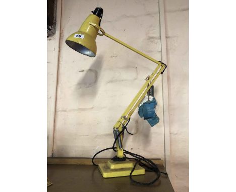 A vintage Herbert Terry &amp; Sons anglepoise lamp with stepped base, yellow painted finish and original hanging paper labels