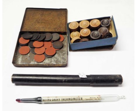 A vintage glass Floating Dairy Thermometer - sold with a box containing wooden Draught pieces and a similar tin