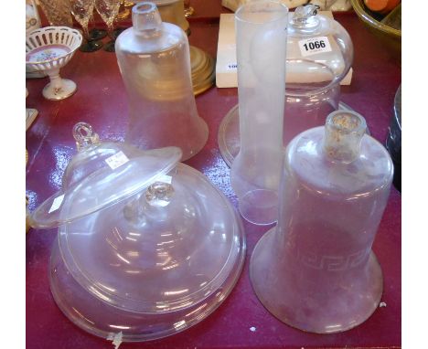 A large Victorian blown glass smoke trap of bell form with turned over rim and brass hanging loop and three further examples 