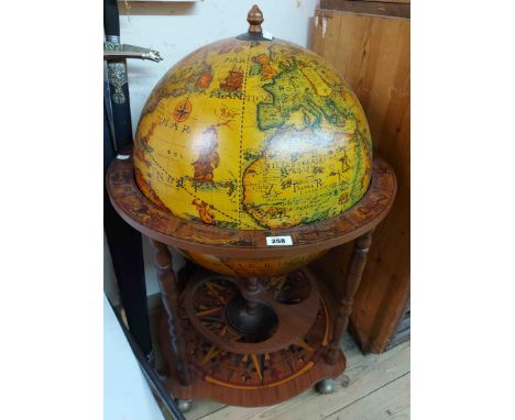 A 20th Century Zoffoli (Italian) globe pattern cocktail drinks cabinet with decorative printed decoration and compass points 