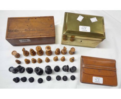 A carved wooden chess set in slide-top box (one white pawn from a different set) and an old French leather card case with two