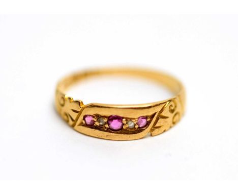 A ruby and diamond 18ct yellow gold ring, size N, 1.8g gross.