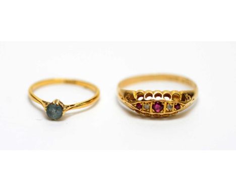 A diamond and ruby ring, on 18ct yellow gold shank, ring size Q; and a blue stone ring, the shank stamped '22ct', ring size J