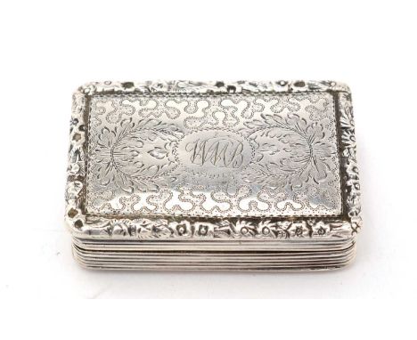 A large George IV silver vinaigrette, by Thomas &amp; William Simpson, Birmingham 1824, rectangular with engraved floral desi