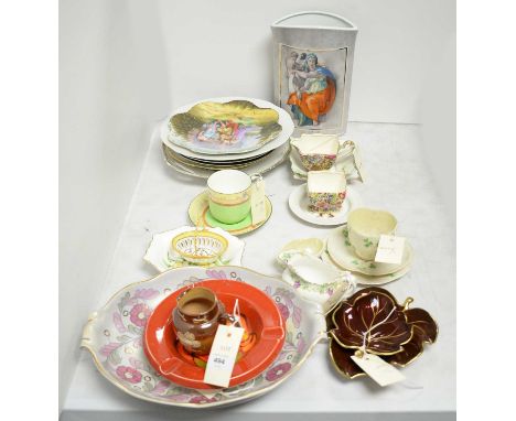 A selection of decorative ceramics, including: Doulton Lambeth jug; Belleek tea trio; Royal Doulton tea cup and saucer; Goebe