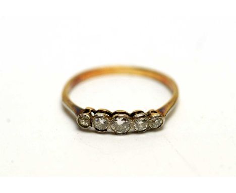 A diamond five stone ring, set with five graduated collet set brilliant cut diamonds, weighing a total of approximately 0.25 