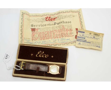Helvetia: a 9ct yellow gold cased wristwatch, with manual wind movement and leather strap, boxed.