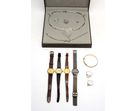 A paste cluster ring, the shank stamped '14K'; ladies watches by Omega, Skagen, and Tissot; and other paste jewellery set in 