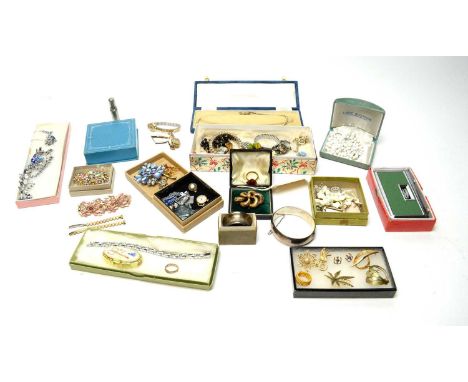 A selection of costume jewellery, silver and accessories including: a silver napkin ring; 1960's silver bangle, with engraved