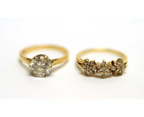 Two gold rings set with paste stones, on 14ct yellow gold shanks, ring sizes O, 5.8g gross. 