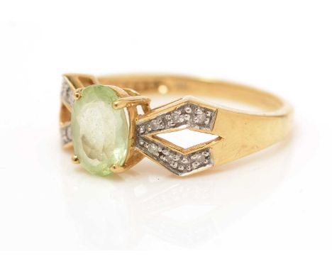 A peridot and diamond ring, on 18ct yellow gold shank, ring size N, 3.3g gross; and a green apatite and diamond ring, on 18ct