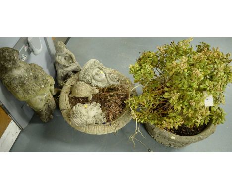 A selection of stone composite garden ornaments and planters, including: a stone composite garden planter, moulded with fleur