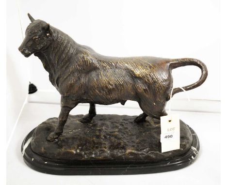 A bronze figure group of a bull, modelled standing, by A.L.Barey (?), with inscribed signature to base, raised on an oval mar