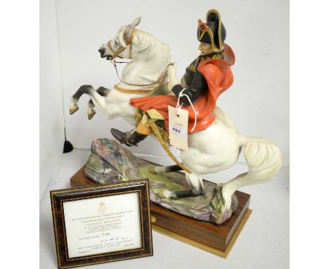 A Royal Worcester figure of Napoleon Bonaparte, modelled by Bernard Winskill, limited edition 748/750, raised on a stained wo