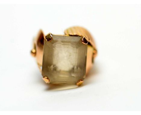 A citrine dress ring, the rectangular step-cut citrine, in modern yellow metal mount, ring size L, 9.1g gross. 