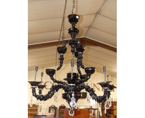 A large Murano amethyst moulded glass hanging six light electrolier, of knopped form, with crystal glass hanging ornamental d