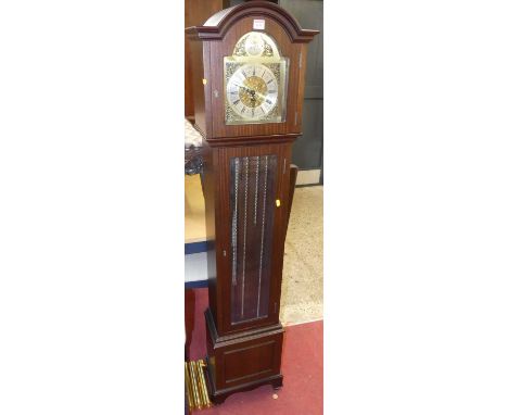A contemporary mahogany grandmother clock, by William Widdop, having an arched silvered and brass dial, glazed trunk door wit