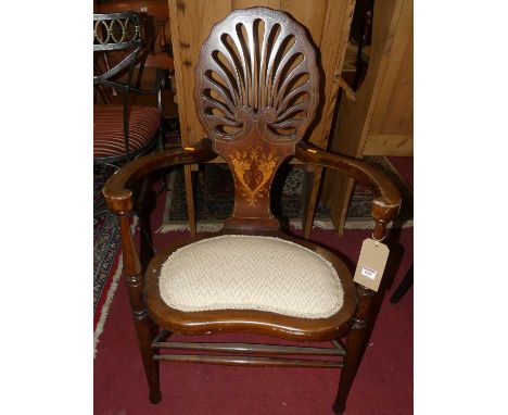 An Edwardian inlaid beechwood armchair, the kidney shaped seat with pad cushion 