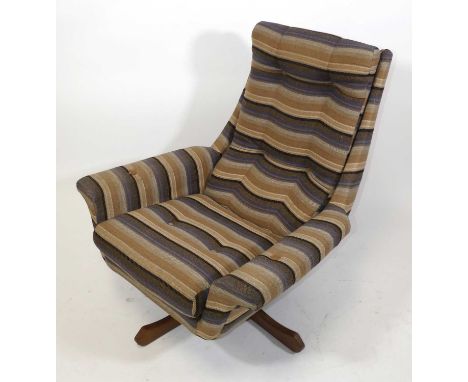 A 1970s Danish woven striped upholstered swivel armchair, having a squab cushion, raised on flat-sided faceted teak four-spok