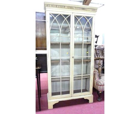 A later painted glazed double door bookcase, with adjustable shelves and on bracket feet, w.88cmA few marks throughout, but m