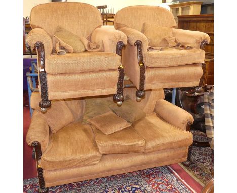 An early 20th century mahogany framed and later fabric upholstered three-piece suite, comprising; three-seater sofa, width 18