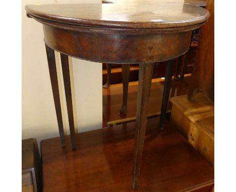 An early 19th century mahogany demi-lune fold-over tea table, having rear gate leg action, width 71cm
