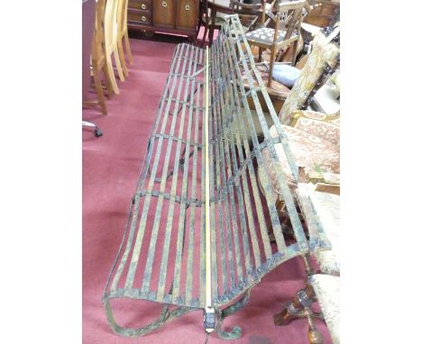 A large Regency iron strapwork country house garden six-bay bench seat, w.303cmOne slat off, but present.One small piece off 