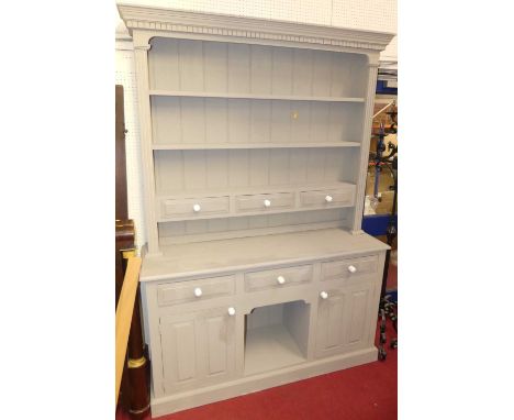 A contemporary grey painted pine kitchen dresser, with white ceramic knob handles, height 213cm, width 150cm
