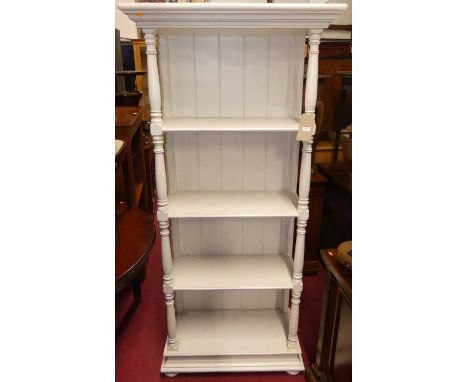 A contemporary white painted freestanding open four tier display shelf, with ring turned columns, with 83cm