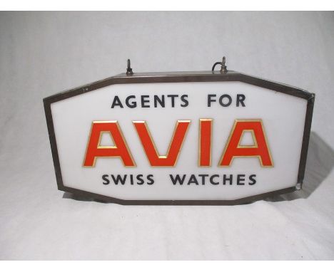 An Avia Swiss Watches light-up shop advertising sign