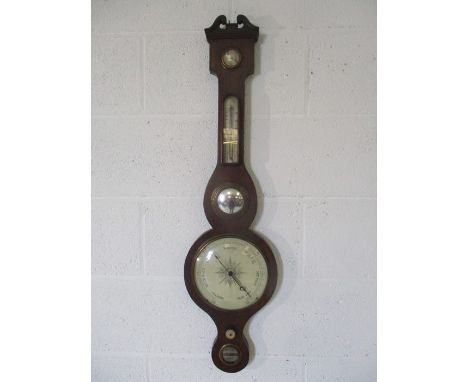 An antique banjo barometer