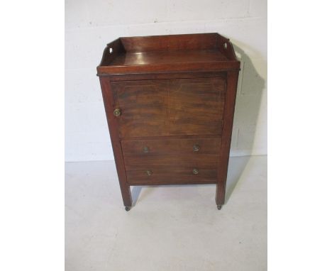 A Georgian mahogany commode with one drawer  
