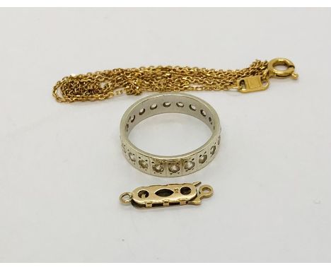 A 9ct white gold eternity ring along with a 9ct clasp (weight for both 3.7g) and an 18ct gold fine chain (2.2g)