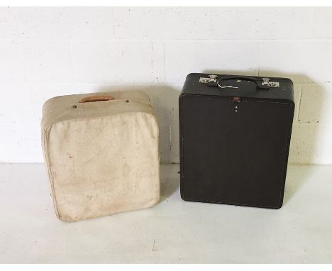 Two vintage wardrobe suitcases including a "Rev-Robe" with canvas covers