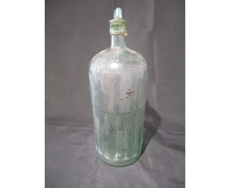 A vintage glass poisons bottle