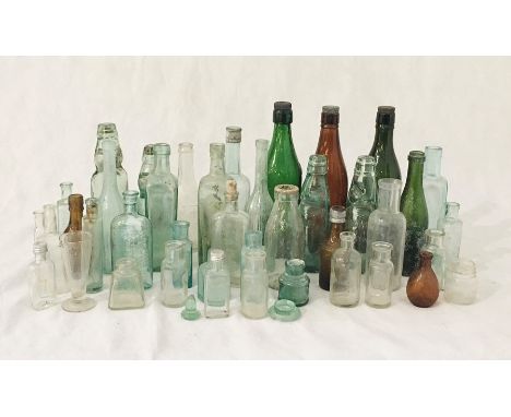  A collection of vintage glass bottles etc