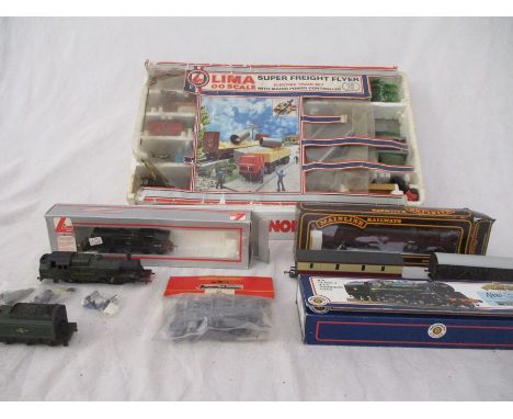 A boxed Lima Super Freight Flyer ( A/F) along with a Bachmann BR Class 4 boxed loco, various carriages etc.