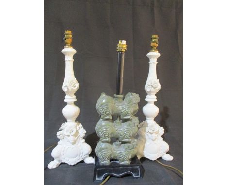A pair of Italian white ceramic lamps ( 1 A/F) along with an Oriental style lamp with dogs of Fo