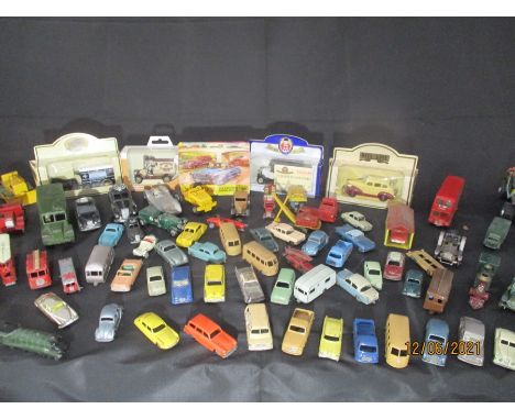 A selection of vintage play worn model cars including Lesney, Corgi and Dinky