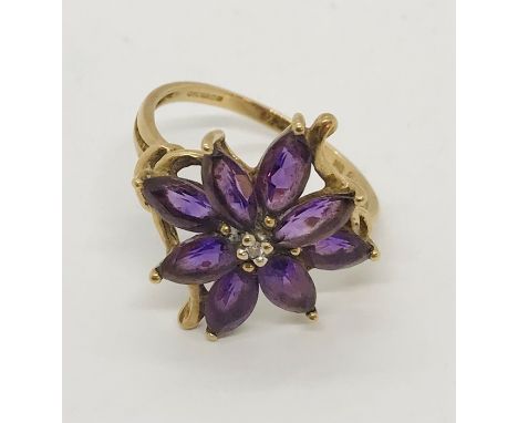 A 9ct gold amethyst and diamond dress ring