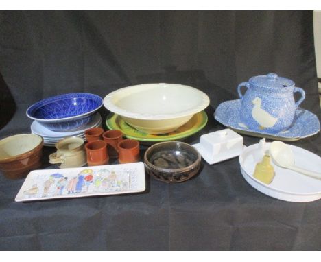 A collection of ceramic chargers, plates, pottery bowls etc