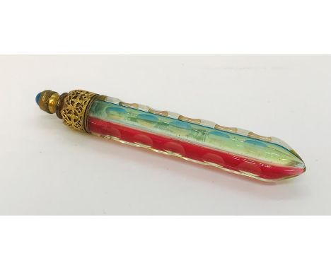 A Victorian scent bottle with multi coloured body, gilt mount and cabochon Lapis Lazuli finial, 8.25cm length 