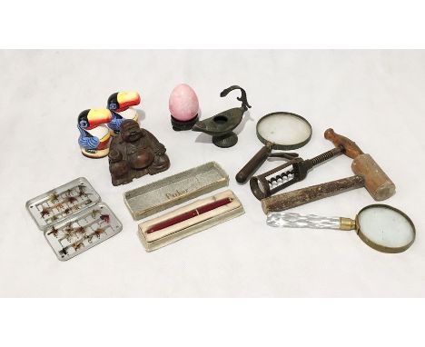 A collection of interesting items including Buddha, Guinness salt and pepper shakers, Parker pen, vintage magnifying glasses 