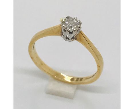 An 18ct gold diamond solitaire ring