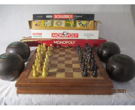 A set of Slazenger bowls, chess set, games etc.