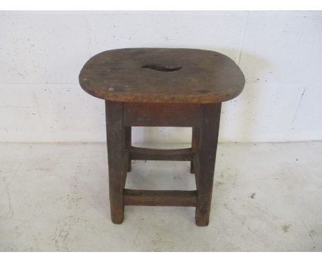 A vintage wooden stool