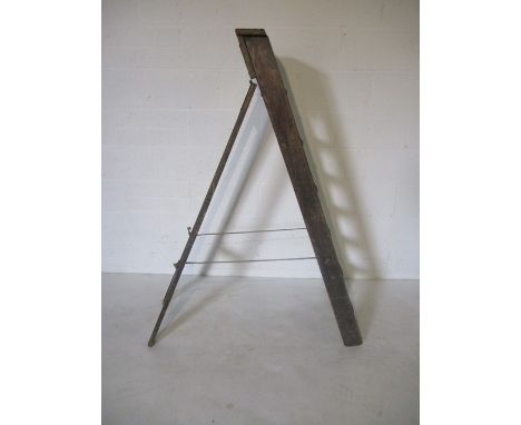 A vintage set of step ladders.