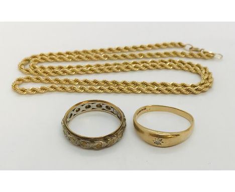A 9 ct gold rope chain along with a 9ct ring set with a small diamond ( A/F) and a 9ct gold eternity ring, total weight 9.6g