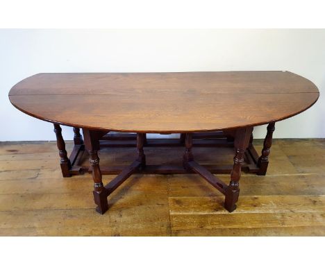 A large 18th century style oak double gateleg table, 230 cm wideOverall condition good, just light wear 