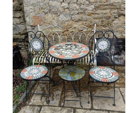 A garden table, 60 cm diameter, two matching chairs, a stool, and a garden bench (5) 